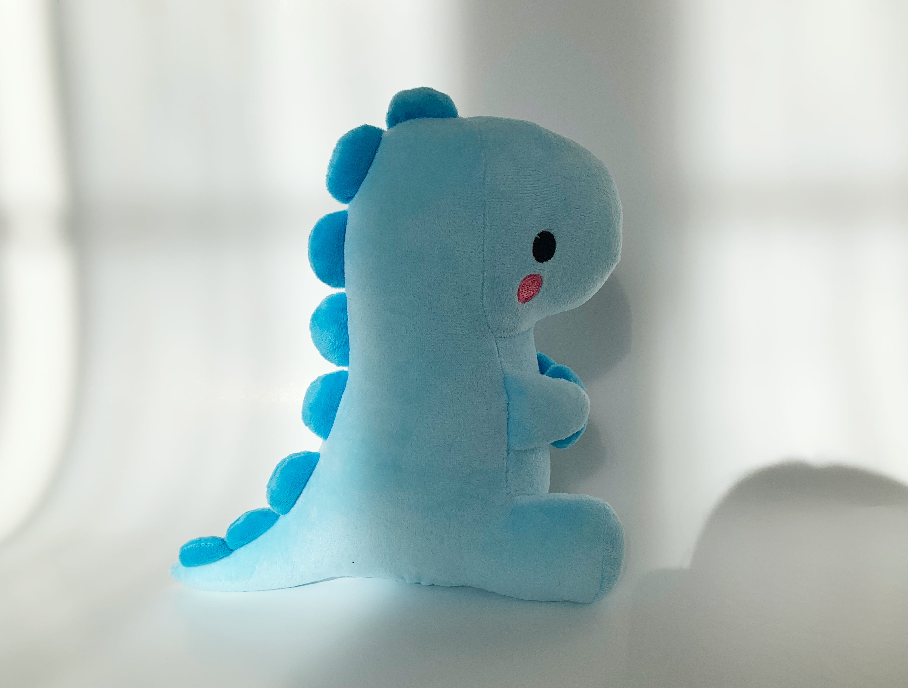 Blue heart dinosaur plushie